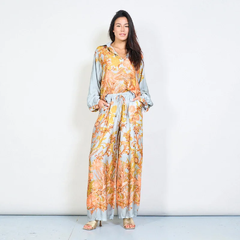 Floral blouse with open neckline and long sleeves wholesale